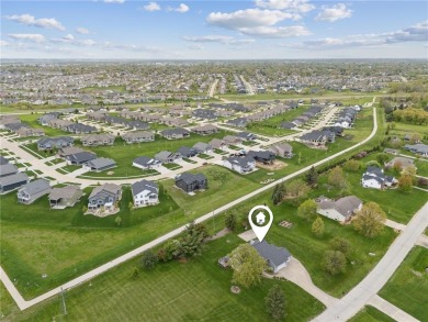 This stunning 4-bedroom, 2.5-bath home sits on a rare double lot on Hunters Ridge Golf Course in Iowa - for sale on GolfHomes.com, golf home, golf lot