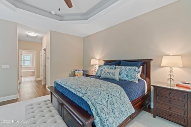 Step into luxury coastal living with this impeccable residence on Members Club At St. James Plantation in North Carolina - for sale on GolfHomes.com, golf home, golf lot