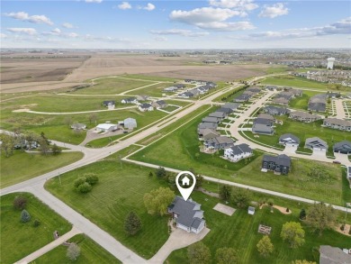 This stunning 4-bedroom, 2.5-bath home sits on a rare double lot on Hunters Ridge Golf Course in Iowa - for sale on GolfHomes.com, golf home, golf lot