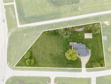This stunning 4-bedroom, 2.5-bath home sits on a rare double lot on Hunters Ridge Golf Course in Iowa - for sale on GolfHomes.com, golf home, golf lot
