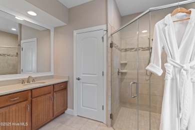 Step into luxury coastal living with this impeccable residence on Members Club At St. James Plantation in North Carolina - for sale on GolfHomes.com, golf home, golf lot