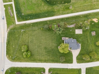 This stunning 4-bedroom, 2.5-bath home sits on a rare double lot on Hunters Ridge Golf Course in Iowa - for sale on GolfHomes.com, golf home, golf lot