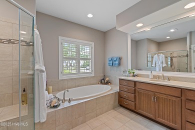 Step into luxury coastal living with this impeccable residence on Members Club At St. James Plantation in North Carolina - for sale on GolfHomes.com, golf home, golf lot