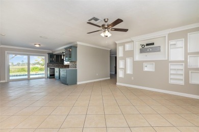 One or more photo(s) has been virtually staged. Light and bright on Rotonda Golf and Country Club The Hills Course in Florida - for sale on GolfHomes.com, golf home, golf lot