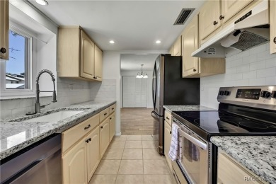 This charming pet-friendly 2-bedroom, 2-bathroom condo is a on Sugarmill Woods Golf and Country Club in Florida - for sale on GolfHomes.com, golf home, golf lot
