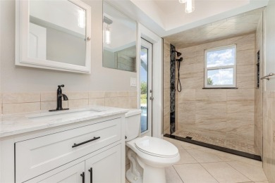One or more photo(s) has been virtually staged. Light and bright on Rotonda Golf and Country Club The Hills Course in Florida - for sale on GolfHomes.com, golf home, golf lot