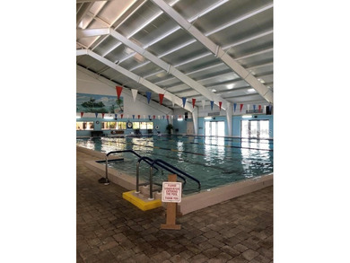 OUTSTANDING WATER VIEWS set the stage for this charming on Sandpiper Golf Club in Florida - for sale on GolfHomes.com, golf home, golf lot