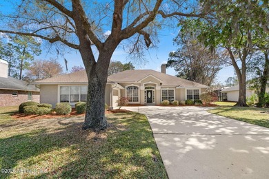 Beautiful 4-bedroom, 3-bath home overlooking the water and the on Eagle Harbor Golf Club in Florida - for sale on GolfHomes.com, golf home, golf lot