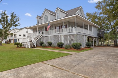 After 30 years of single family ownership, this 2,486 SF home is on Pass Christian Isles Golf Club in Mississippi - for sale on GolfHomes.com, golf home, golf lot