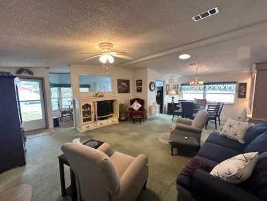 Beautiful stucco home on the exterior perimeter.  Updated on Del Tura Golf and Country Club in Florida - for sale on GolfHomes.com, golf home, golf lot