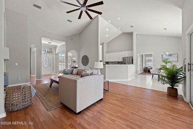 Beautiful 4-bedroom, 3-bath home overlooking the water and the on Eagle Harbor Golf Club in Florida - for sale on GolfHomes.com, golf home, golf lot