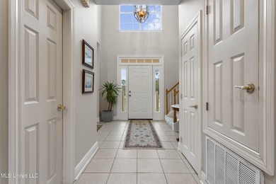 After 30 years of single family ownership, this 2,486 SF home is on Pass Christian Isles Golf Club in Mississippi - for sale on GolfHomes.com, golf home, golf lot