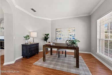 Beautiful 4-bedroom, 3-bath home overlooking the water and the on Eagle Harbor Golf Club in Florida - for sale on GolfHomes.com, golf home, golf lot