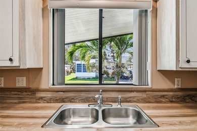 Welcome to Glenwood Estates, one of the area's most vibrant 55+ on Largo Golf Course in Florida - for sale on GolfHomes.com, golf home, golf lot