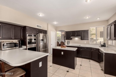 Your DREAM home is perfectly nestled on a premium golf course on The Foothills Golf Club in Arizona - for sale on GolfHomes.com, golf home, golf lot