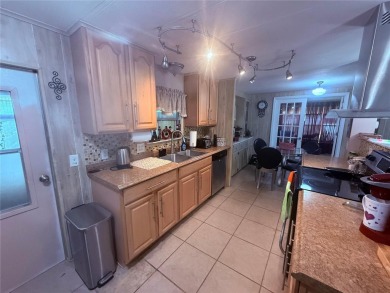 Welcome  to this spacious 2 bedroom 2 bath home on the 3rd hole on High Point Golf Club, Inc. in Florida - for sale on GolfHomes.com, golf home, golf lot