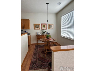 Check out this spacious & sunny end unit w/golf course views! It on The Broadlands Golf Course in Colorado - for sale on GolfHomes.com, golf home, golf lot