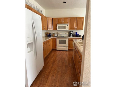 Check out this spacious & sunny end unit w/golf course views! It on The Broadlands Golf Course in Colorado - for sale on GolfHomes.com, golf home, golf lot