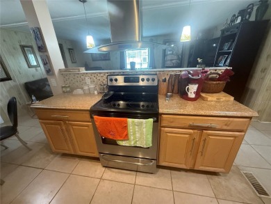 Welcome  to this spacious 2 bedroom 2 bath home on the 3rd hole on High Point Golf Club, Inc. in Florida - for sale on GolfHomes.com, golf home, golf lot