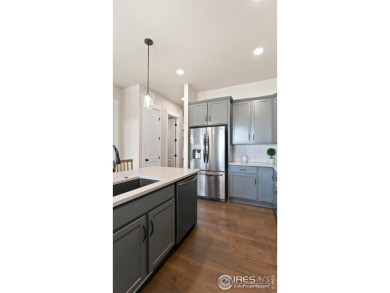 The Avalon by Landmark Homes offers lock & leave, unparalleled on Highland Meadows Golf Course in Colorado - for sale on GolfHomes.com, golf home, golf lot