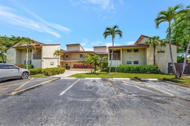 Remodeled 2/2 condo that lives like a home - Impact windows and on Woodmont Country Club in Florida - for sale on GolfHomes.com, golf home, golf lot