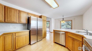Enjoy low-maintenance mountain living in this beautifully on Estes Park Golf Course in Colorado - for sale on GolfHomes.com, golf home, golf lot