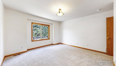 Enjoy low-maintenance mountain living in this beautifully on Estes Park Golf Course in Colorado - for sale on GolfHomes.com, golf home, golf lot