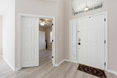 Come home every day to this LIGHT, BRIGHT & SPACIOUS home - on Golf Club At North Hampton in Florida - for sale on GolfHomes.com, golf home, golf lot