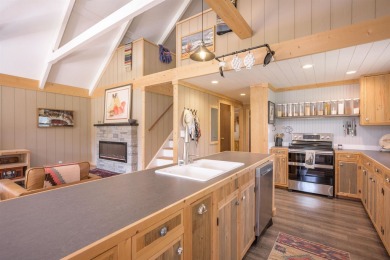 Settle into this charming mountain home overlooking the 11th on Angel Fire Resort Country Club in New Mexico - for sale on GolfHomes.com, golf home, golf lot