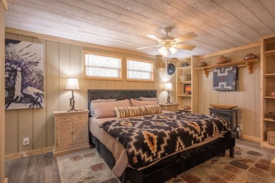 Settle into this charming mountain home overlooking the 11th on Angel Fire Resort Country Club in New Mexico - for sale on GolfHomes.com, golf home, golf lot