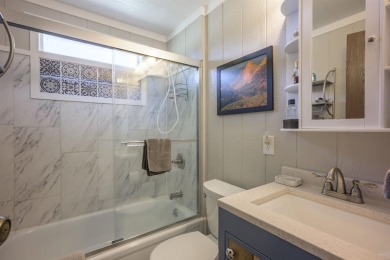 Settle into this charming mountain home overlooking the 11th on Angel Fire Resort Country Club in New Mexico - for sale on GolfHomes.com, golf home, golf lot