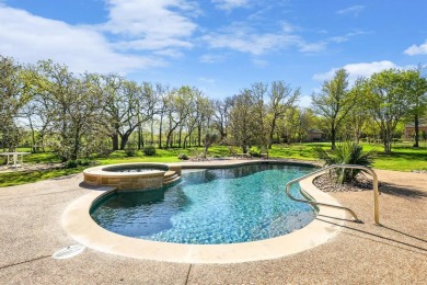 This stunning home sits on 1.2 acres in The Estates of Tour 18 on Tour 18 Golf Course Dallas in Texas - for sale on GolfHomes.com, golf home, golf lot