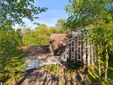 Experience the true Pocono feel in this warm and inviting on Pocono Farms Country Club in Pennsylvania - for sale on GolfHomes.com, golf home, golf lot