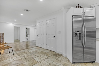You won't find a property like this!!!3 bedrooms 2 bathrooms on Palm Beach National Golf and Country Club in Florida - for sale on GolfHomes.com, golf home, golf lot