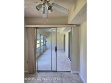 Priced to sell. Nice, first floor unit, 2/2 with enclosed porch on Heather Golf and Country Club in Florida - for sale on GolfHomes.com, golf home, golf lot
