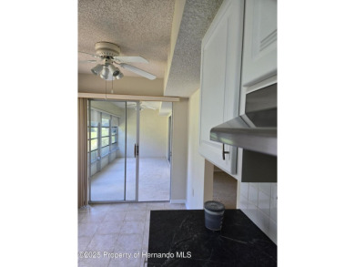 Priced to sell. Nice, first floor unit, 2/2 with enclosed porch on Heather Golf and Country Club in Florida - for sale on GolfHomes.com, golf home, golf lot