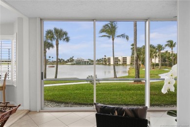 Walk to Deeded Beach!  Beautiful waterfront condo w/ glassed in on Ocean Club At the Hutchinson Island Beach Resort and Marina in Florida - for sale on GolfHomes.com, golf home, golf lot