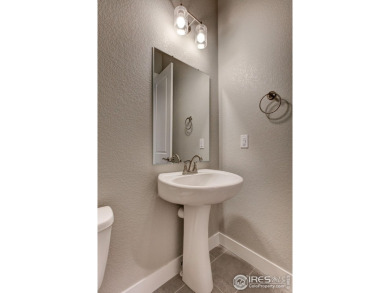 The Avalon by Landmark Homes offers lock & leave, unparalleled on Highland Meadows Golf Course in Colorado - for sale on GolfHomes.com, golf home, golf lot
