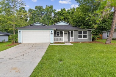 Welcome to this beautifully updated 3-bedroom, 2-bathroom home on Turkey Creek Golf and Country Club in Florida - for sale on GolfHomes.com, golf home, golf lot