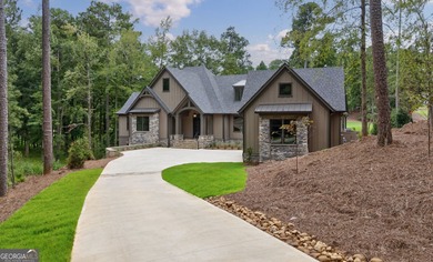 Nestled within the prestigious Reynolds Lake Oconee community on Reynolds Lake Oconee - The National  in Georgia - for sale on GolfHomes.com, golf home, golf lot