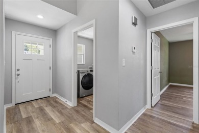 Welcome to this beautifully updated 3-bedroom, 2-bathroom home on Turkey Creek Golf and Country Club in Florida - for sale on GolfHomes.com, golf home, golf lot