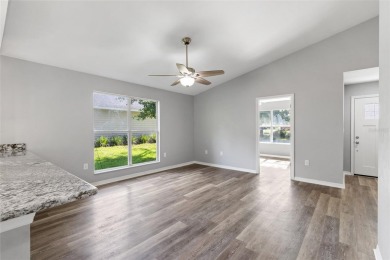Welcome to this beautifully updated 3-bedroom, 2-bathroom home on Turkey Creek Golf and Country Club in Florida - for sale on GolfHomes.com, golf home, golf lot