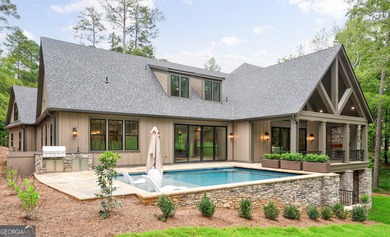 Nestled within the prestigious Reynolds Lake Oconee community on Reynolds Lake Oconee - The National  in Georgia - for sale on GolfHomes.com, golf home, golf lot