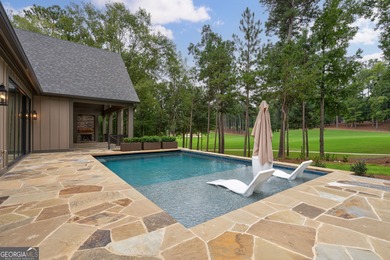 Nestled within the prestigious Reynolds Lake Oconee community on Reynolds Lake Oconee - The National  in Georgia - for sale on GolfHomes.com, golf home, golf lot