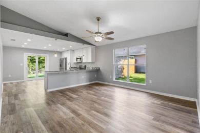 Welcome to this beautifully updated 3-bedroom, 2-bathroom home on Turkey Creek Golf and Country Club in Florida - for sale on GolfHomes.com, golf home, golf lot
