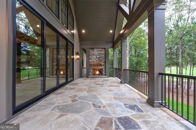 Nestled within the prestigious Reynolds Lake Oconee community on Reynolds Lake Oconee - The National  in Georgia - for sale on GolfHomes.com, golf home, golf lot