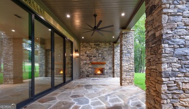 Nestled within the prestigious Reynolds Lake Oconee community on Reynolds Lake Oconee - The National  in Georgia - for sale on GolfHomes.com, golf home, golf lot