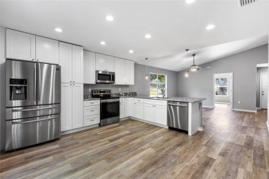 Welcome to this beautifully updated 3-bedroom, 2-bathroom home on Turkey Creek Golf and Country Club in Florida - for sale on GolfHomes.com, golf home, golf lot