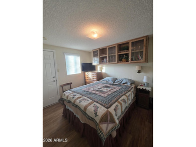 This rare 2bedroom, 2bathroom home offers a spacious living room on Great Eagle Golf Club in Arizona - for sale on GolfHomes.com, golf home, golf lot