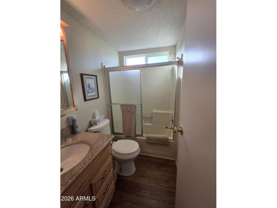 This rare 2bedroom, 2bathroom home offers a spacious living room on Great Eagle Golf Club in Arizona - for sale on GolfHomes.com, golf home, golf lot